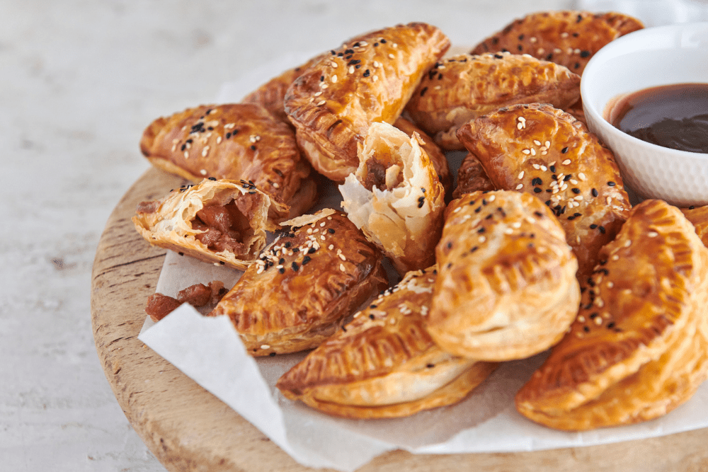A sticky, scrumptious Char Siu BBQ pork filling is wrapped up in flaky, buttery puff pastry goodness to create this simple, Asian-inspired canape that packs huge amounts of umami flavour. Guaranteed to become a firm family favourite, adults and kids alike will be begging you for more!