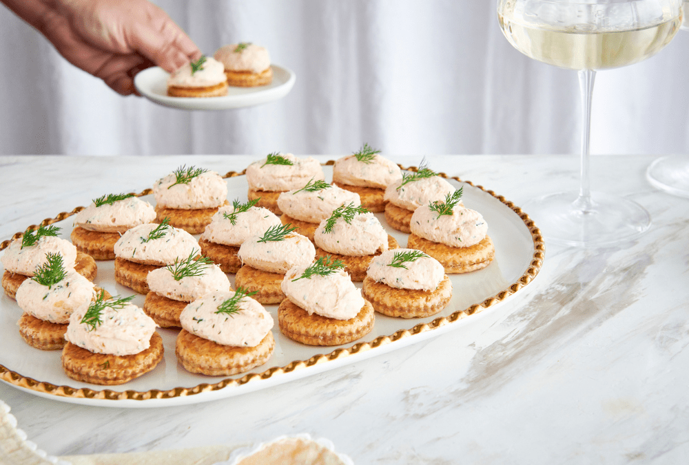 Turn up the flavour for easy entertaining with these delightful Smoked Salmon Puffs. The classic flavour combination of creamy salmon pâté marries perfectly with the freshness of the dill and sits scrumptiously on top of a light flaky puff base. The only challenge will be not eating them all before your guests arrive!